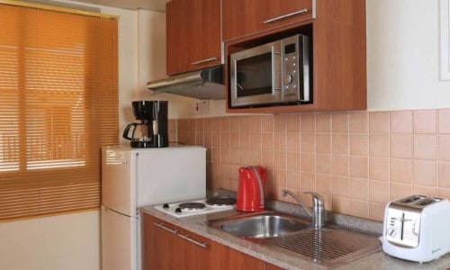 Kitchenette at Panthea Holiday Village in Ayia Napa, Cyprus. Travel with World Lifetime Journeys