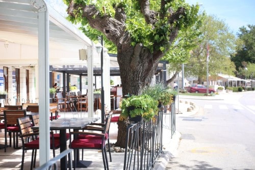 Outdoor restaurant at Pension Palace in Baska Voda, Croatia. Travel with World Lifetime Journeys