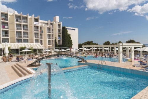 Pool area at Bluesun Hotel Alga near Makarska, Croatia. Travel with World Lifetime Journeys