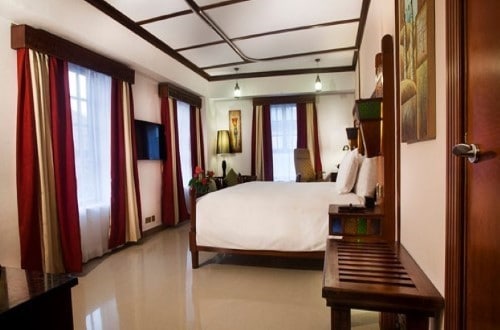 Bedroom at DoubleTree Stone Town, Zanzibar. Travel with World Lifetime Journeys