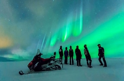 Day 6 Enjoy a snowmobiling tour with Northern Lights above. Travel with World Lifetime Journeys
