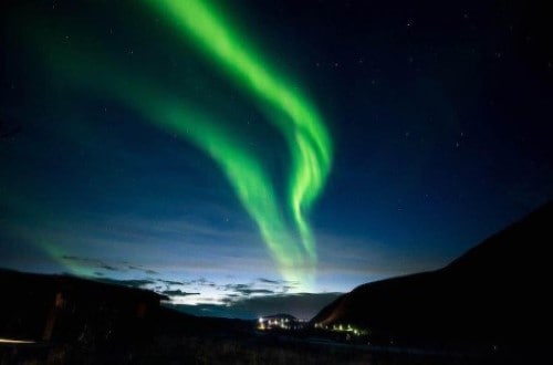 Day 8 Aurora borealis or the Northern Lights over Kjollefjord. Travel with World Lifetime Journeys