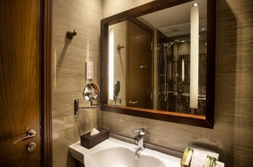 Deluxe bathroom at DoubleTree Stone Town, Zanzibar. Travel with World Lifetime Journeys