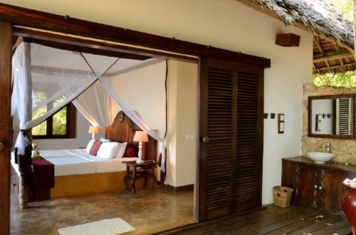 Double bedroom at Fumba Beach Lodge, Zanzibar. Travel with World Lifetime Journeys