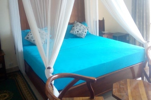 Double bedroom at Sunset Kendwa in Zanzibar. Travel with World Lifetime Journeys