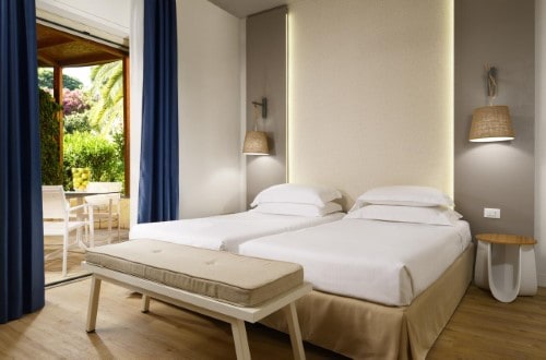 Double room at UNAHOTELS Naxos Beach in Taormina, Sicily. Travel with World Lifetime Journeys