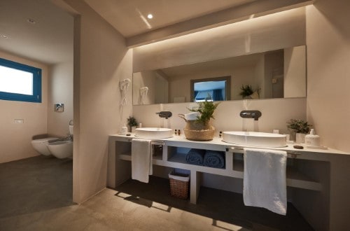 Ensuite bathroom at Voi Marsa Sicla’ Resort in South Sicily, Italy. Travel with World Lifetime Journeys