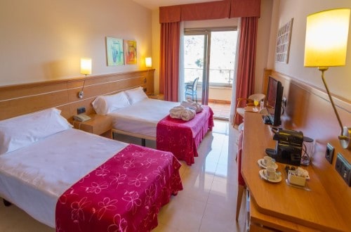 Family room at Golden Bahia de Tossa and Spa in Tossa de Mar, Spain. Travel with World Lifetime Journeys