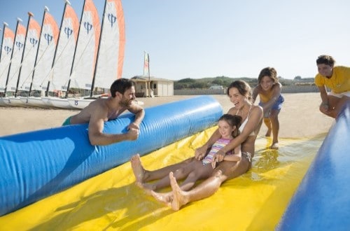 Fun and slides at Club Med Kamarina Bungalows, Sicily. Travel with World Lifetime Journeys
