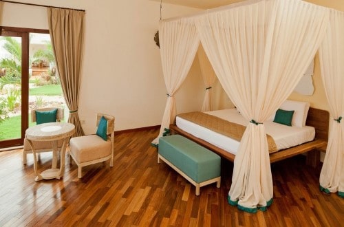 Garden Residence double bed at Essque Zalu, Zanzibar. Travel with World Lifetime Journeys