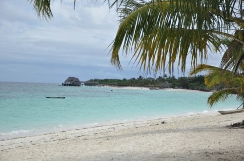 Have a swim in the turquoise waters at Sunset Kendwa in Zanzibar. Travel with World Lifetime Journeys