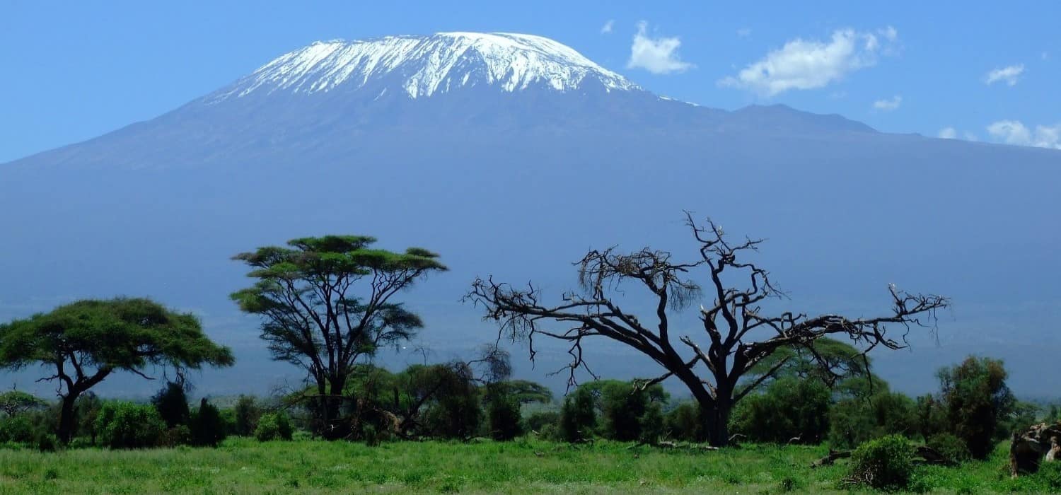 Hiking Kilimanjaro mountain in Tanzania. Travel with World Lifetime Journeys