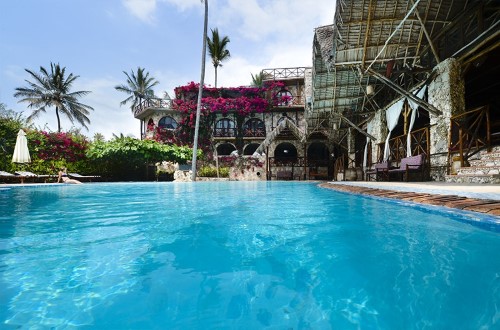 Hotel and swimming pool at Samaki Lodge, Zanzibar. Travel with World Lifetime Journeys