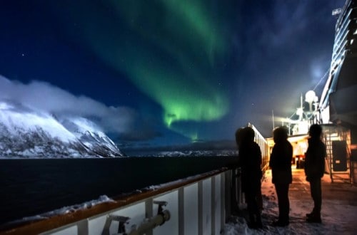 Hunting the northern lights on board MS Nordnorge on Norway Voyages. Travel with World Lifetime Journeys