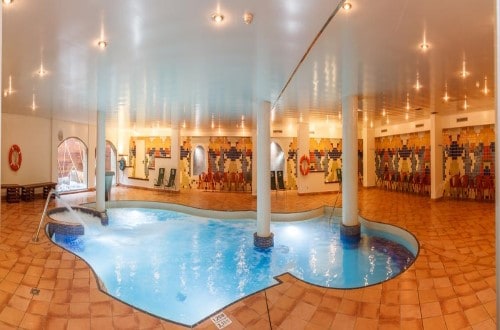Indoor pool at Golden Bahia de Tossa and Spa in Tossa de Mar, Spain. Travel with World Lifetime Journeys