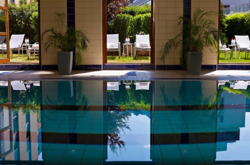 Indoor pool at Imperial Riding School Renaissance Hotel in Vienna, Austria. Travel with World Lifetime Journeys