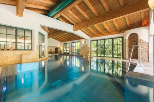 Indoor pool at Romantik Hotel Boglerhof in Alpbach, Austria. Travel with World Lifetime Journeys