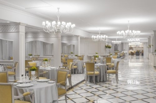Indoor restaurant at Grand Hotel Mazzaro Sea Palace in Taormina, Sicily. Travel with World Lifetime Journeys