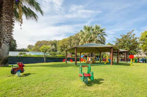 Kids playground at UNAHOTELS Naxos Beach in Taormina, Sicily. Travel with World Lifetime Journeys