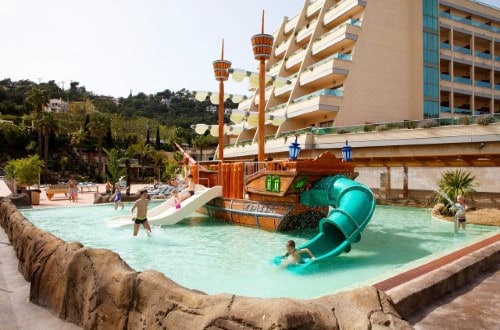 Kids playing at Golden Bahia de Tossa and Spa in Tossa de Mar, Spain. Travel with World Lifetime Journeys