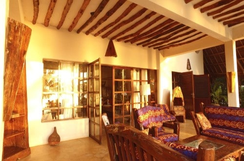 Pool lounge Vila Lisa at Milele Villas, Zanzibar. Travel with World Lifetime Journeys