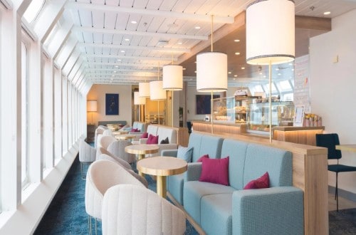 Lounge on MS Nordnorge on Norway Voyages. Travel with World Lifetime Journeys