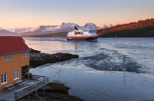 MS Nordnorge passing Rystraumen in Midnight Sun on Norway Voyages. Travel with World Lifetime Journeys