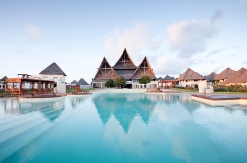 Main building and pool at Essque Zalu, Zanzibar. Travel with World Lifetime Journeys