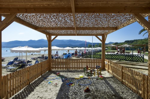 Outdoor kids playground at Roda Beach Resort & Spa in Corfu, Greece. Travel with World Lifetime Journeys