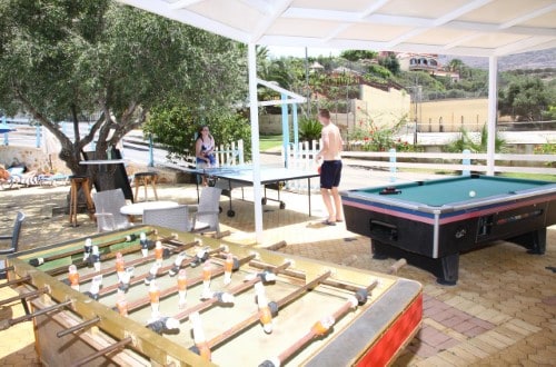 Outdoor play area at Bellos Hotel Apartments in Crete, Greece. Travel with World Lifetime Journeys