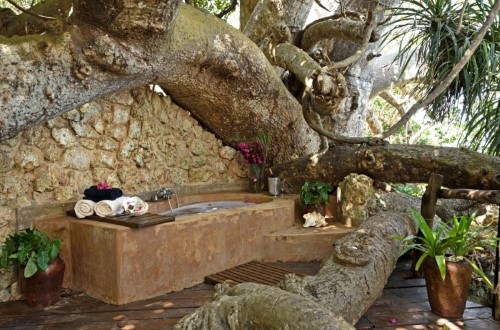 Outside bathroom at Fumba Beach Lodge, Zanzibar. Travel with World Lifetime Journeys