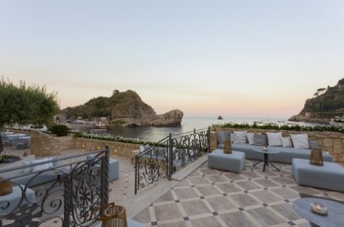 Outside lounge area at Grand Hotel Mazzaro Sea Palace in Taormina, Sicily. Travel with World Lifetime Journeys