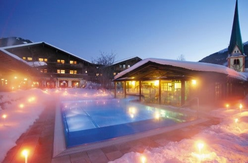 Outside pool at Romantik Hotel Boglerhof in Alpbach, Austria. Travel with World Lifetime Journeys