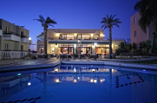 Pool side at Bellos Hotel Apartments in Crete, Greece. Travel with World Lifetime Journeys