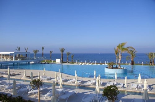 Pool side at King Evelthon Beach Hotel on Paphos, Cyprus. Travel with World Lifetime Journeys