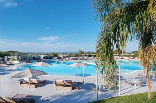 Pool side at Voi Marsa Sicla’ Resort in South Sicily, Italy. Travel with World Lifetime Journeys