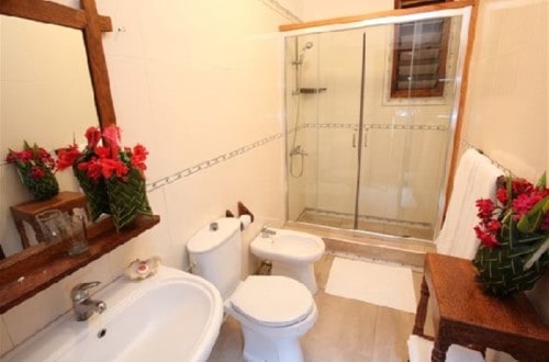 Private bathroom in the room at Palumbo Reef, Zanzibar. Travel with World Lifetime Journeys