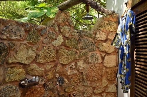 Private shower at Fumba Beach Lodge, Zanzibar. Travel with World Lifetime Journeys