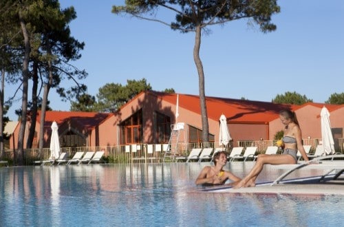 Relax by the pool at La Palmyre Atlantique on France west coast. Travel with World Lifetime Journeys