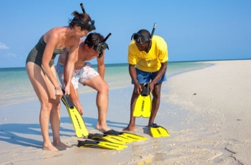 Safari Blue preparing for snorkeling in Zanzibar. Travel with World Lifetime Journeys