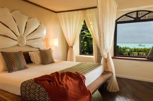 Seafront Suite double bed at Essque Zalu, Zanzibar. Travel with World Lifetime Journeys