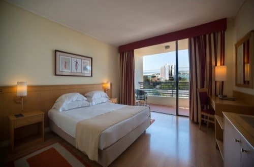 Senior Suite bedroom at Vila Gale Ampalius Hotel in Vilamoura on Algarve coast, Portugal. Travel with World Lifetime Journeys