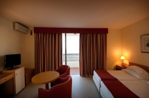 Standard bedroom at Vila Gale Ampalius Hotel in Vilamoura on Algarve coast, Portugal. Travel with World Lifetime Journeys