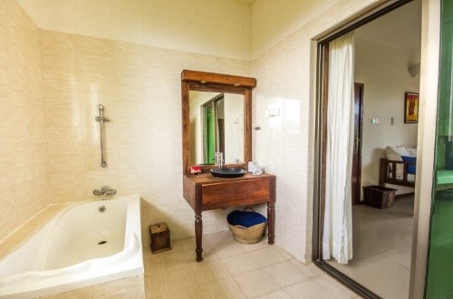 Standard room and bath at Zanzibari Nungwi, Zanzibar. Travel with World Lifetime Journeys