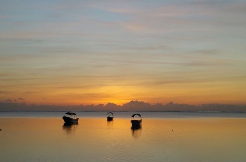 Sunset and boats Che Che Vule Villa, Zanzibar. Travel with World Lifetime Journeys