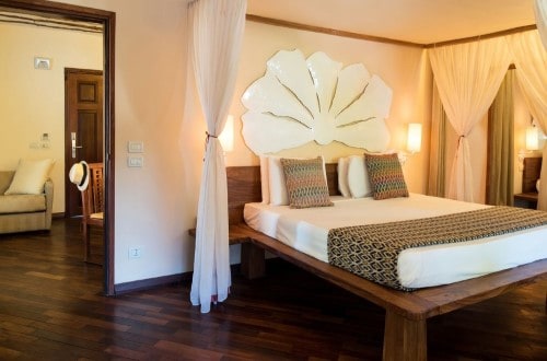 Superior Garden Suite double bed at Essque Zalu, Zanzibar. Travel with World Lifetime Journeys