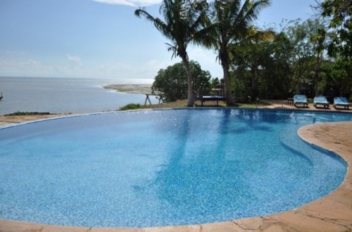 Swimming pool at Fumba Beach Lodge, Zanzibar. Travel with World Lifetime Journeys