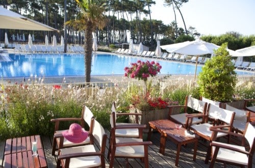 Terrace by the pool at La Palmyre Atlantique on France west coast. Travel with World Lifetime Journeys