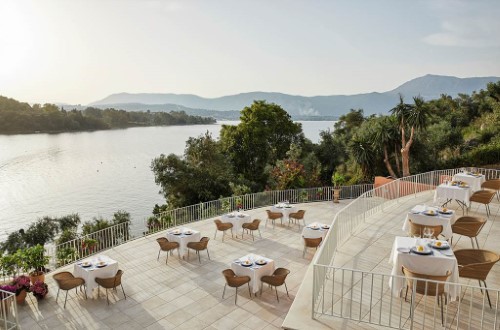 Terrace view at Grecotel Eva Palace in Corfu, Greece. Travel with World Lifetime Journeys