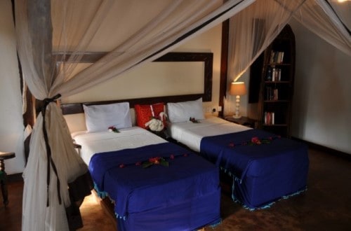 Twin bedroom at Fumba Beach Lodge, Zanzibar. Travel with World Lifetime Journeys